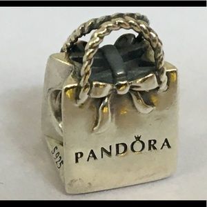 Group 1: Pandora Bag 791184 Pandora Charm $20.00 Each. Good Condition